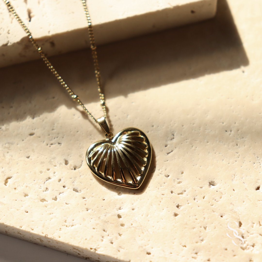 Golden Heart Cage Necklace